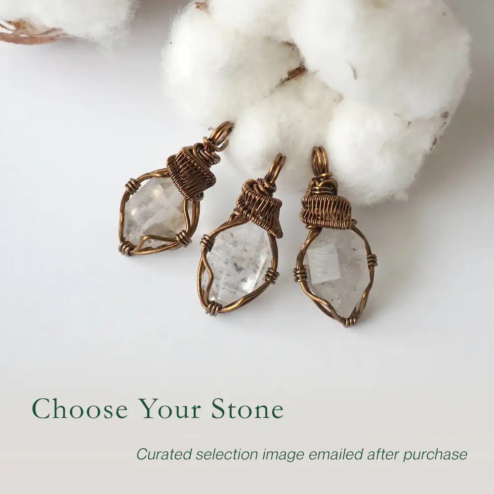 Three raw Herkimer diamond pendants for women showing natural variation in crystal shape, size, and artisan wrapping.