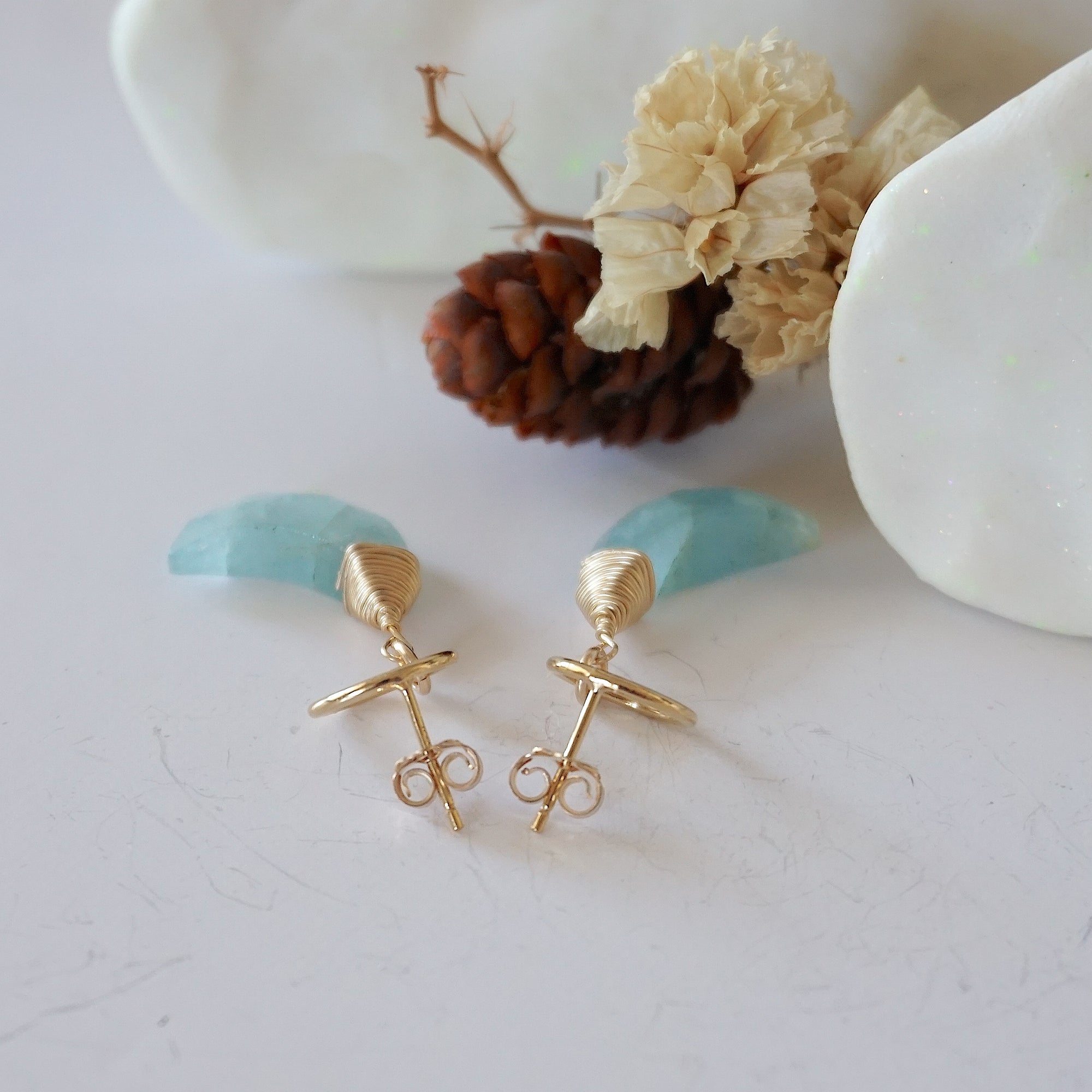 Detailed close-up of open circle stud earring closure, Lux Aquamarine Moon Stud Earrings, 14k gold filled, handmade craftsmanship.