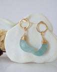 Detailed close-up of Lux Limited Edition Aquamarine Moon Open Circle Stud Earrings on jewelry display, faceted natural aquamarine, 14k gold filled, handmade.