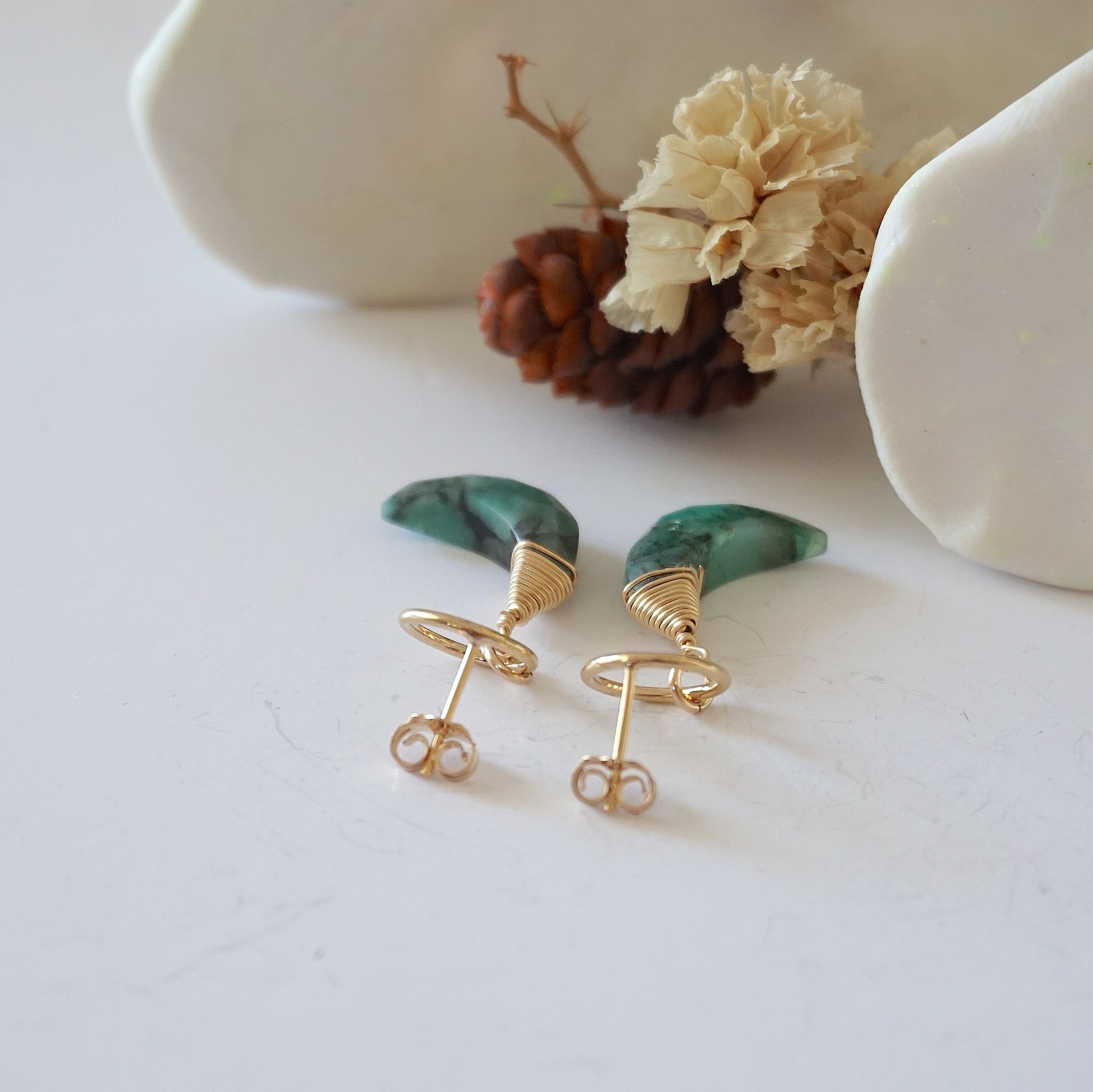 Detailed close-up of open circle stud earring closure, Lux Emerald Moon Stud Earrings, 14k gold filled, handmade craftsmanship.