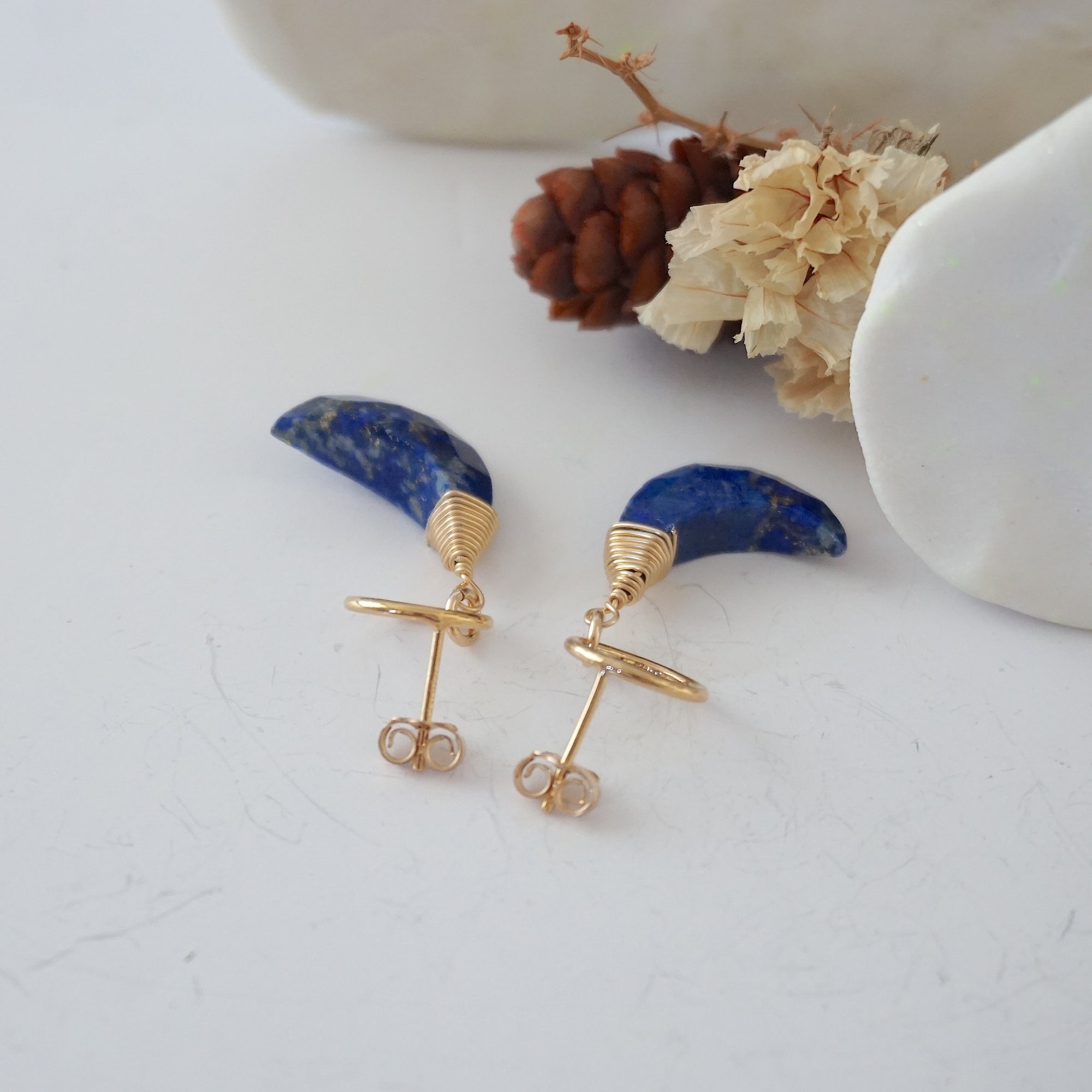 Detailed close-up of open circle stud earring closure, Lux Lapis Lazuli Moon Stud Earrings, 14k gold filled, handmade craftsmanship.