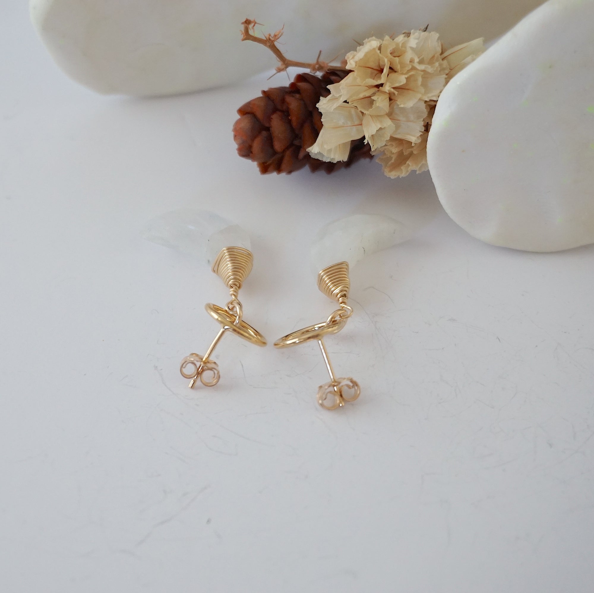 Detailed close-up of open circle stud earring closure, Lux Rainbow Moonstone Moon Stud Earrings, 14k gold filled, handmade craftsmanship.