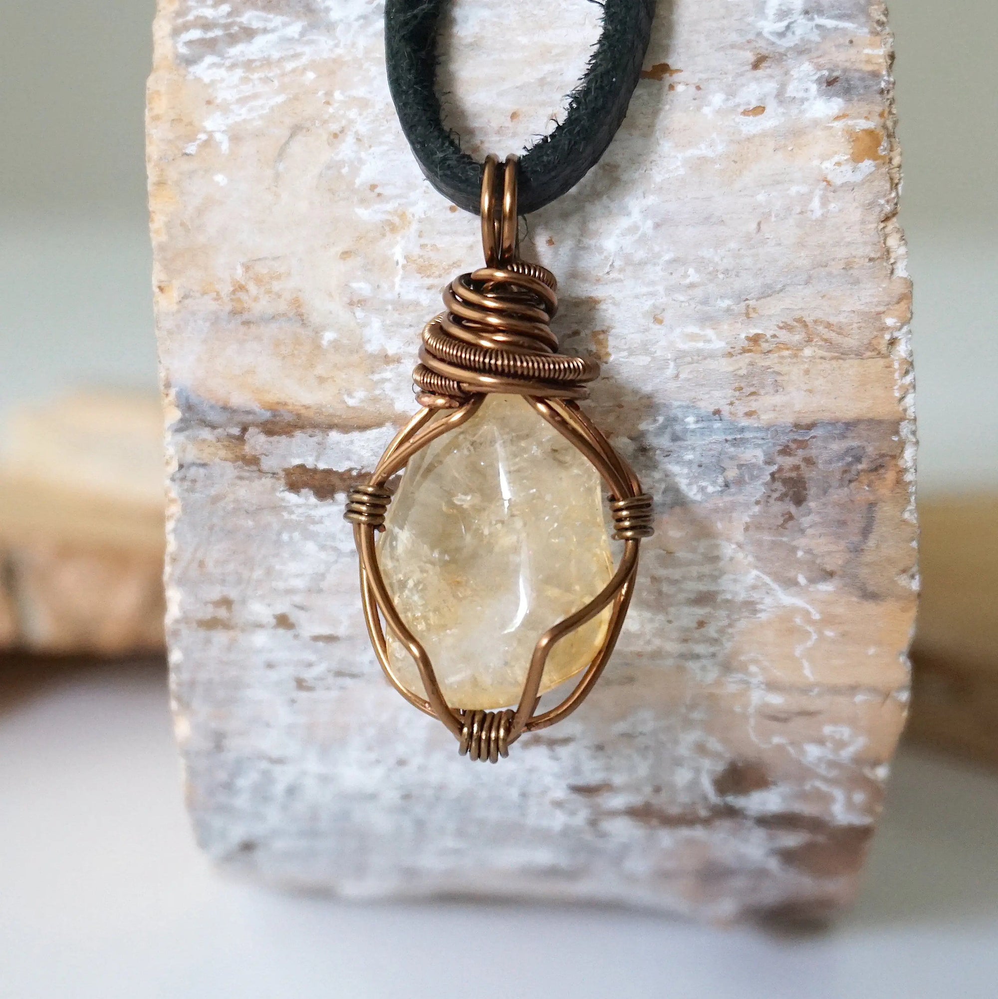 Back view of mens citrine pendant showing antique bronze copper wire wrapping detail - natural crystal handmade masculine jewelry craftsmanship back side