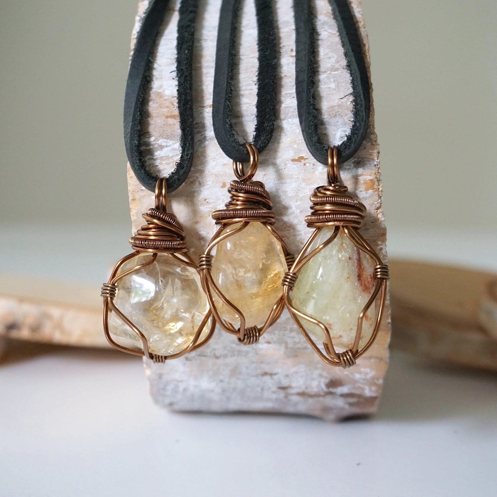 Three natural citrine crystals showing variation in mens necklace pendants - different sizes shapes colors antique bronze wire wrapped unique one of a kind masculine jewelry