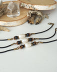 Three men’s pearl leather bracelets showing natural variation in the shape of freshwater pearls