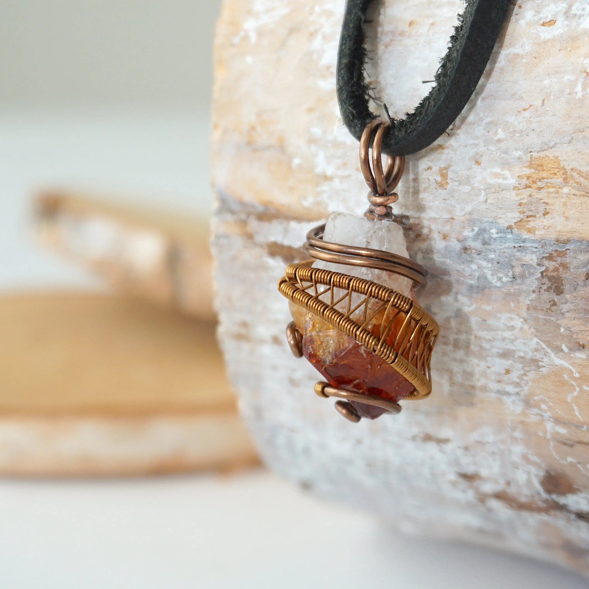 Side angle of mens raw citrine pendant showing crystal dimension and wire wrapping - natural unpolished stone in antique bronze copper handmade masculine necklace profile