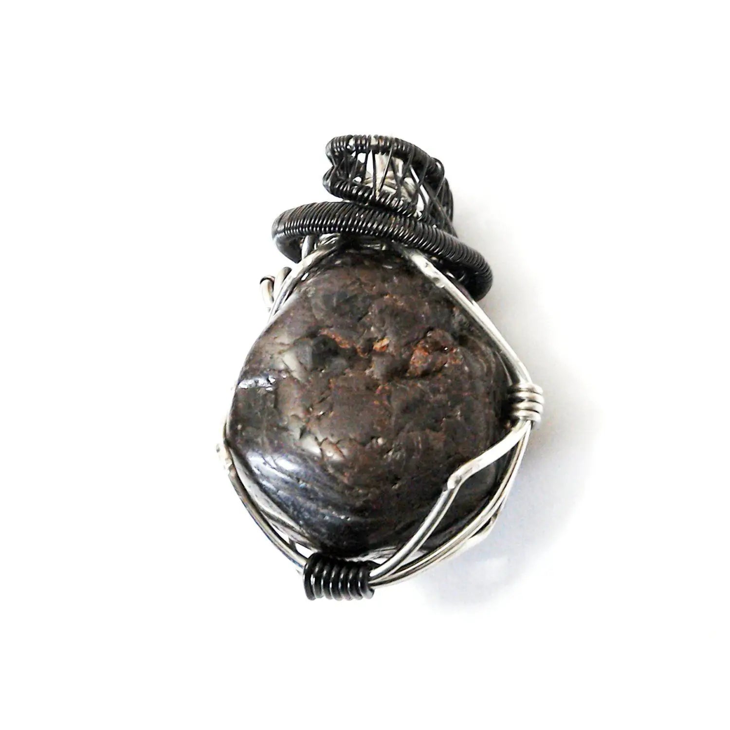 Front view of a men’s wire wrapped garnet pendant necklace featuring a natural garnet wrapped in mixed metal copper wire