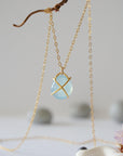 Back angle of minimalist aquamarine necklace in gold, genuine aquamarine and gold vermeil, Designs by Nature Gems