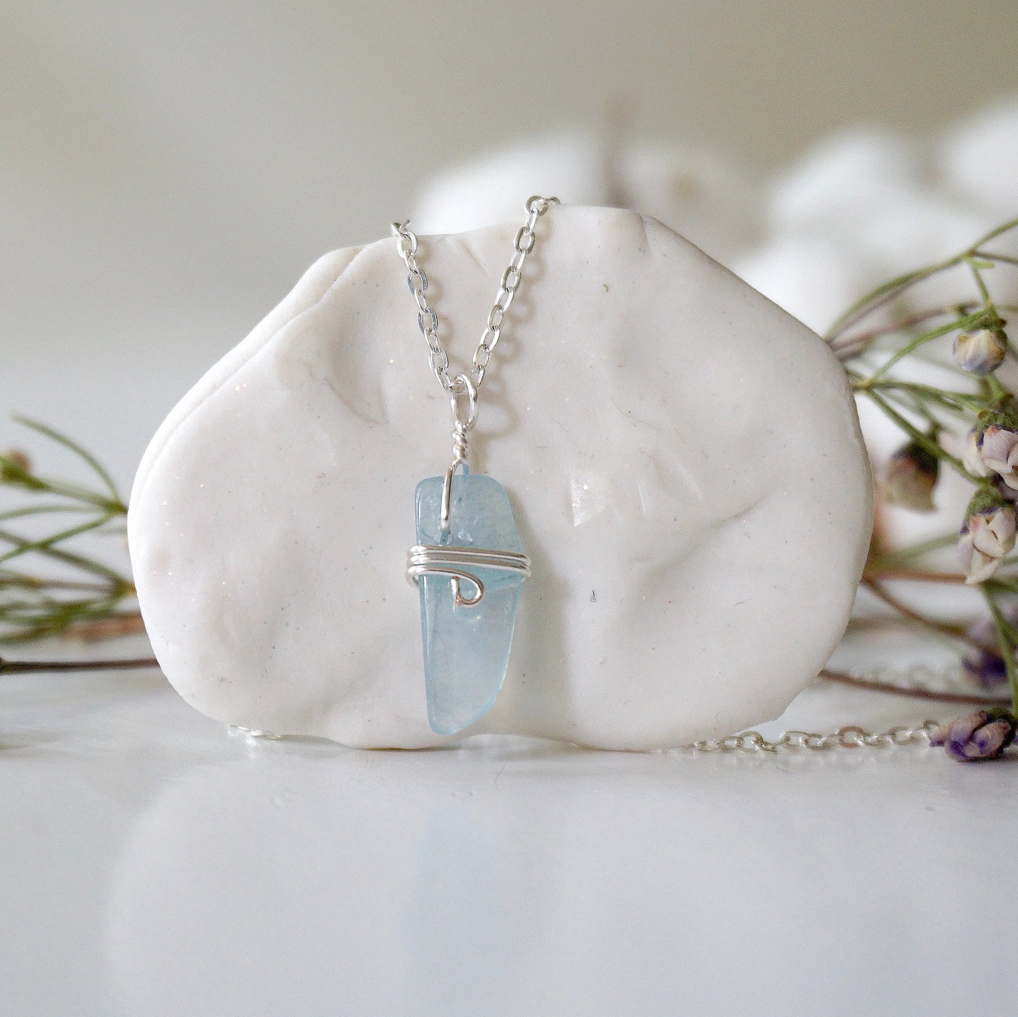 Minimalist aquamarine necklace, detailed front view, genuine polished aquamarine wrapped in soft silver finish over copper wire, March birthstone, Designs by Nature Gems