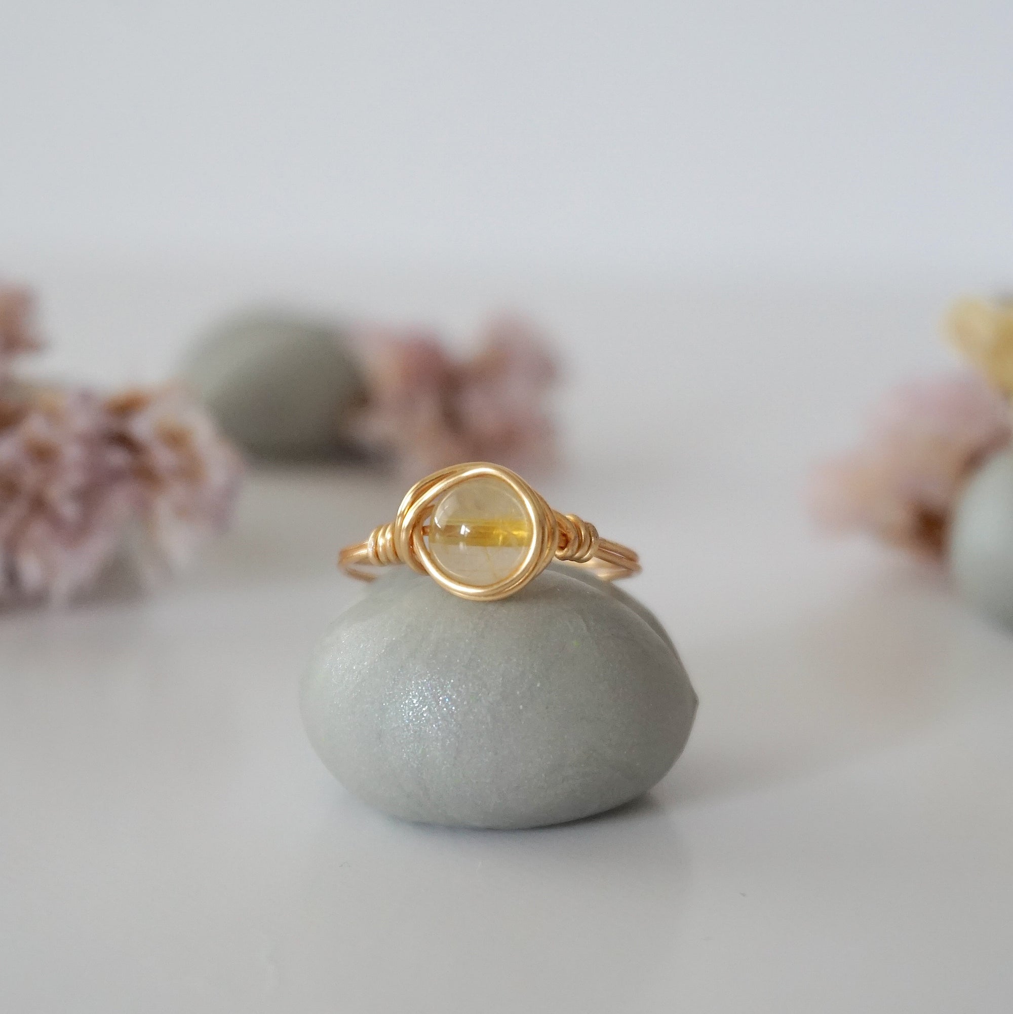 Front view of simple raw citrine ring showing natural yellow crystal wire wrapped in sterling silver gold or copper - handmade minimalist ring