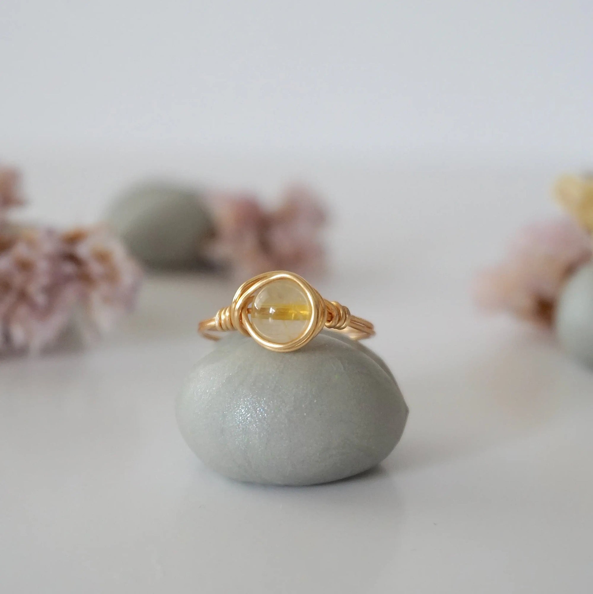 Front view of simple raw citrine ring showing natural yellow crystal wire wrapped in sterling silver gold or copper - handmade minimalist ring