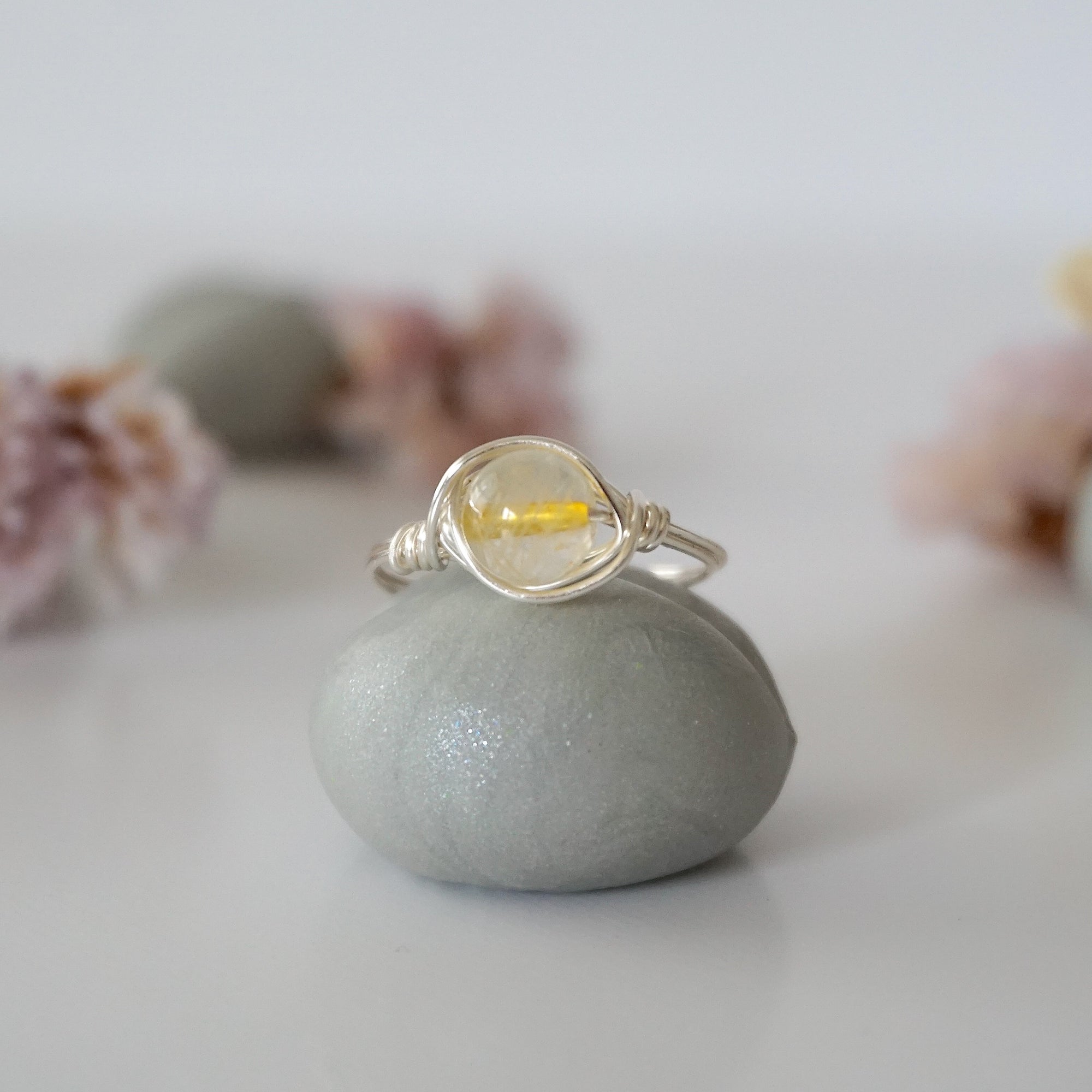 Front view of simple raw citrine ring showing natural yellow crystal wire wrapped in silver - handmade minimalist ring