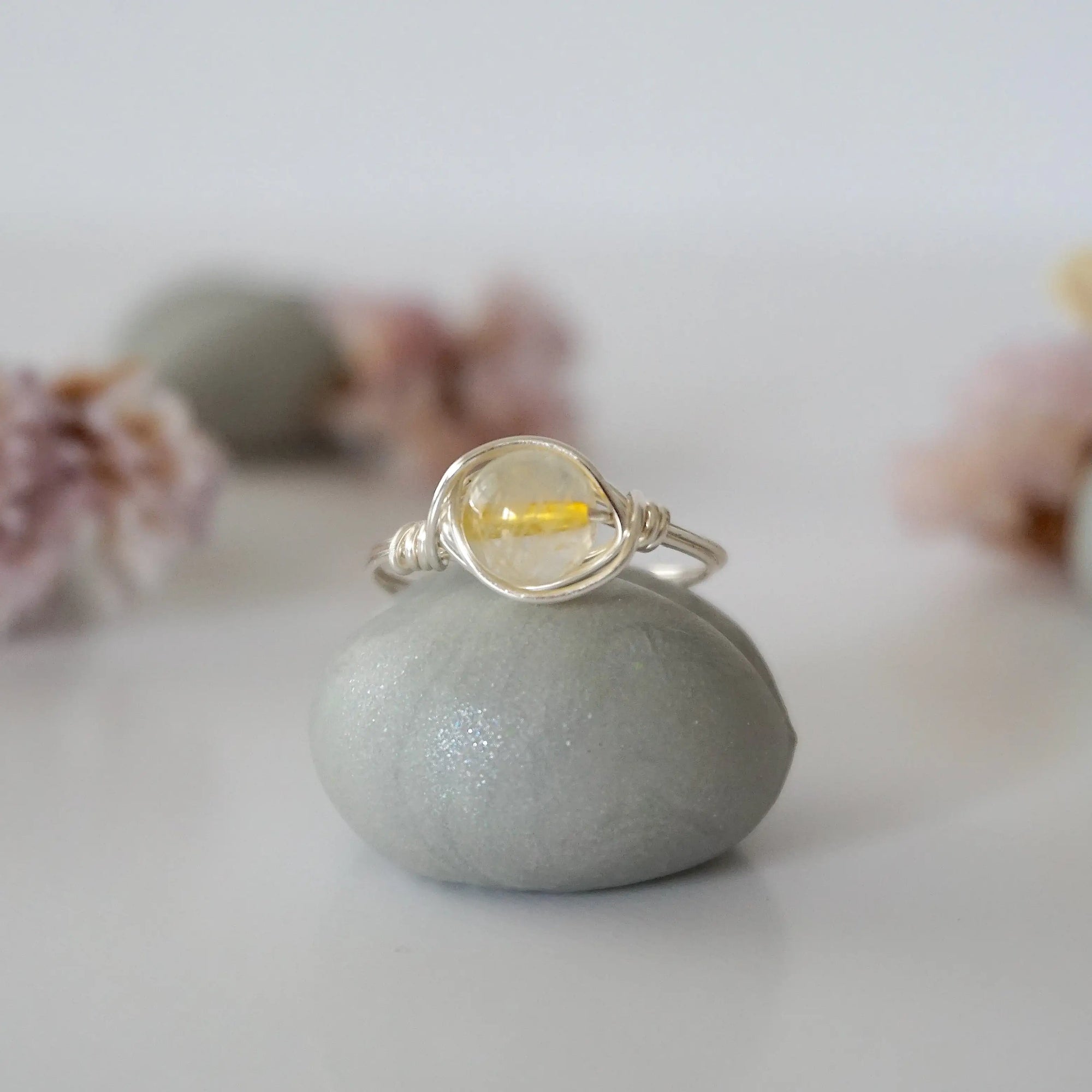 Front view of simple raw citrine ring showing natural yellow crystal wire wrapped in silver - handmade minimalist ring