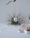 Zoomed out front view of minimalist raw Herkimer diamond necklace in 925 sterling silver for women.