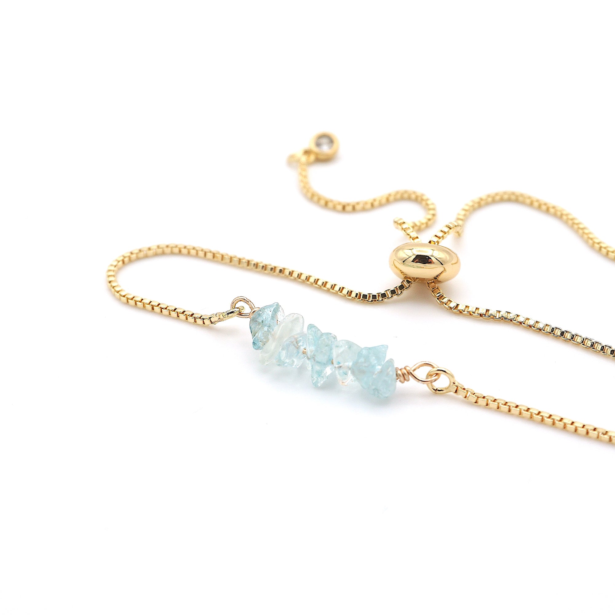 Natural aquamarine slider bracelet with raw blue aquamarine crystals on gold plated brass adjustable chain - March birthstone jewelry for women