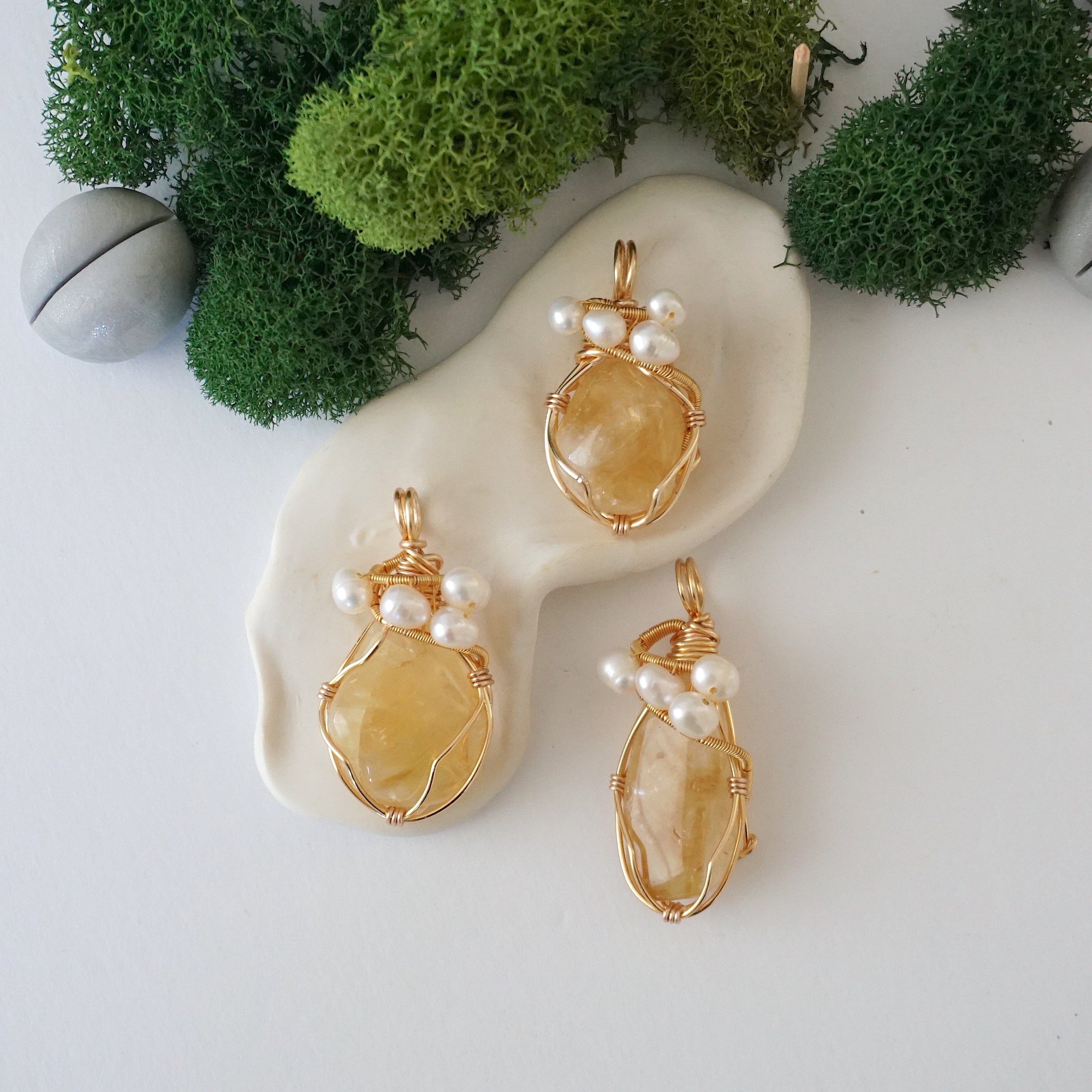 Natural citrine crystal variation showing different sizes shapes and golden color shades - each citrine pearl necklace pendant is unique and one of a kind