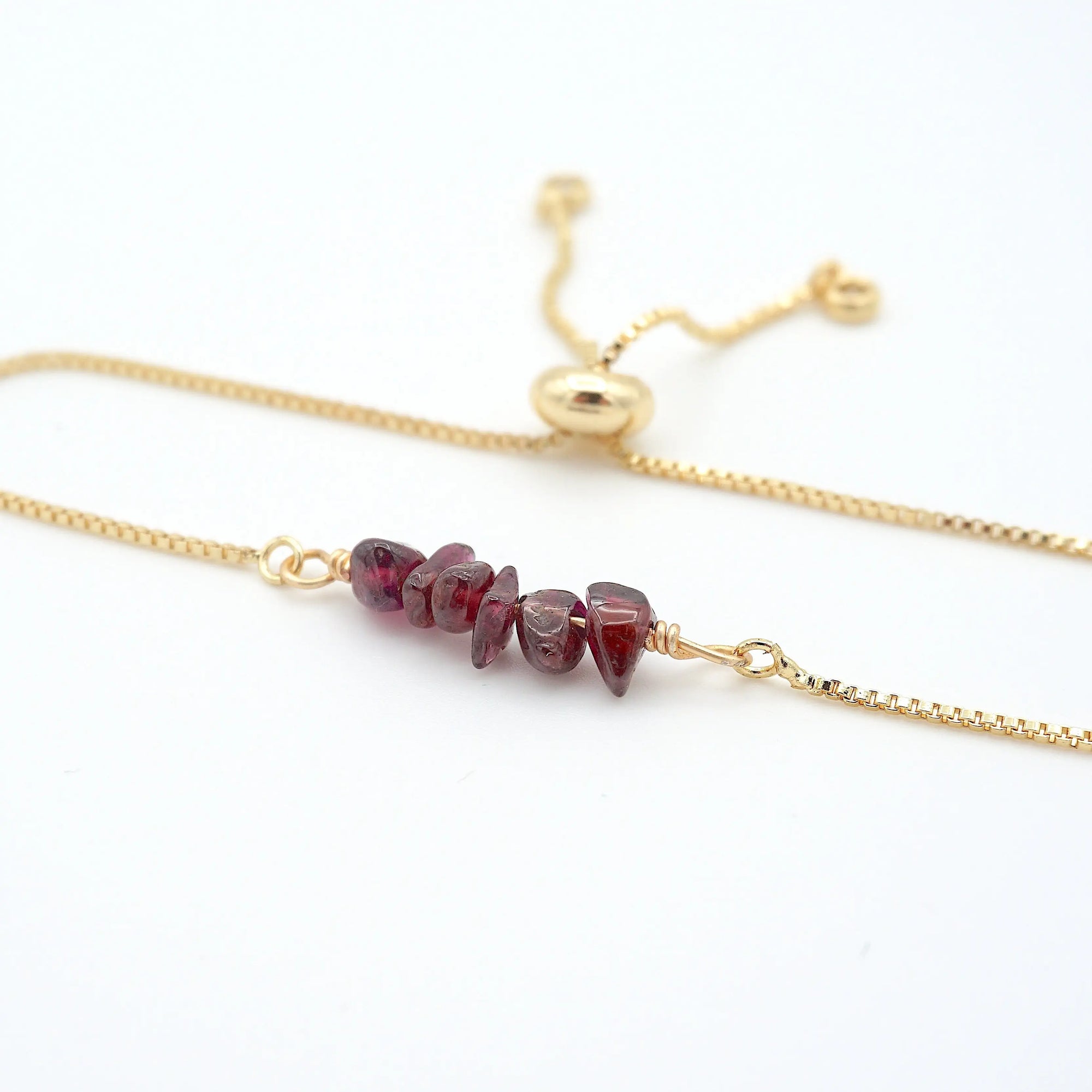 Natural garnet slider bracelet with raw red garnet crystals on gold plated brass adjustable chain - January birthstone jewelry for women