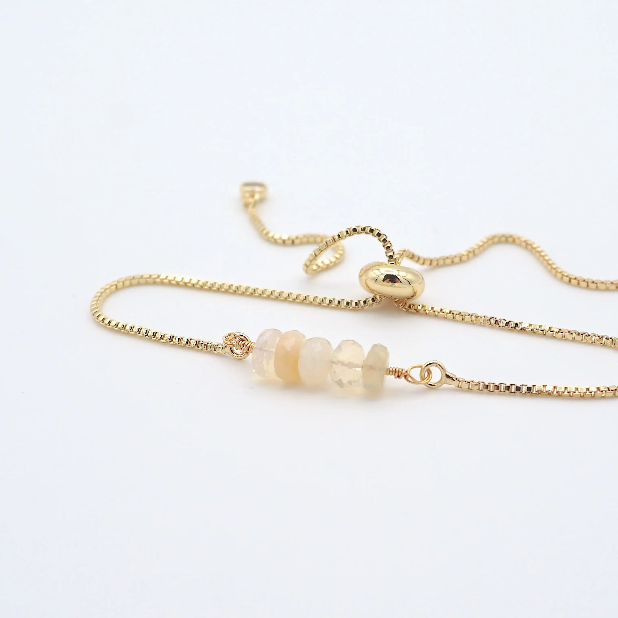 Natural opal slider bracelet with raw opal crystals on gold plated brass adjustable chain - October birthstone jewelry for women