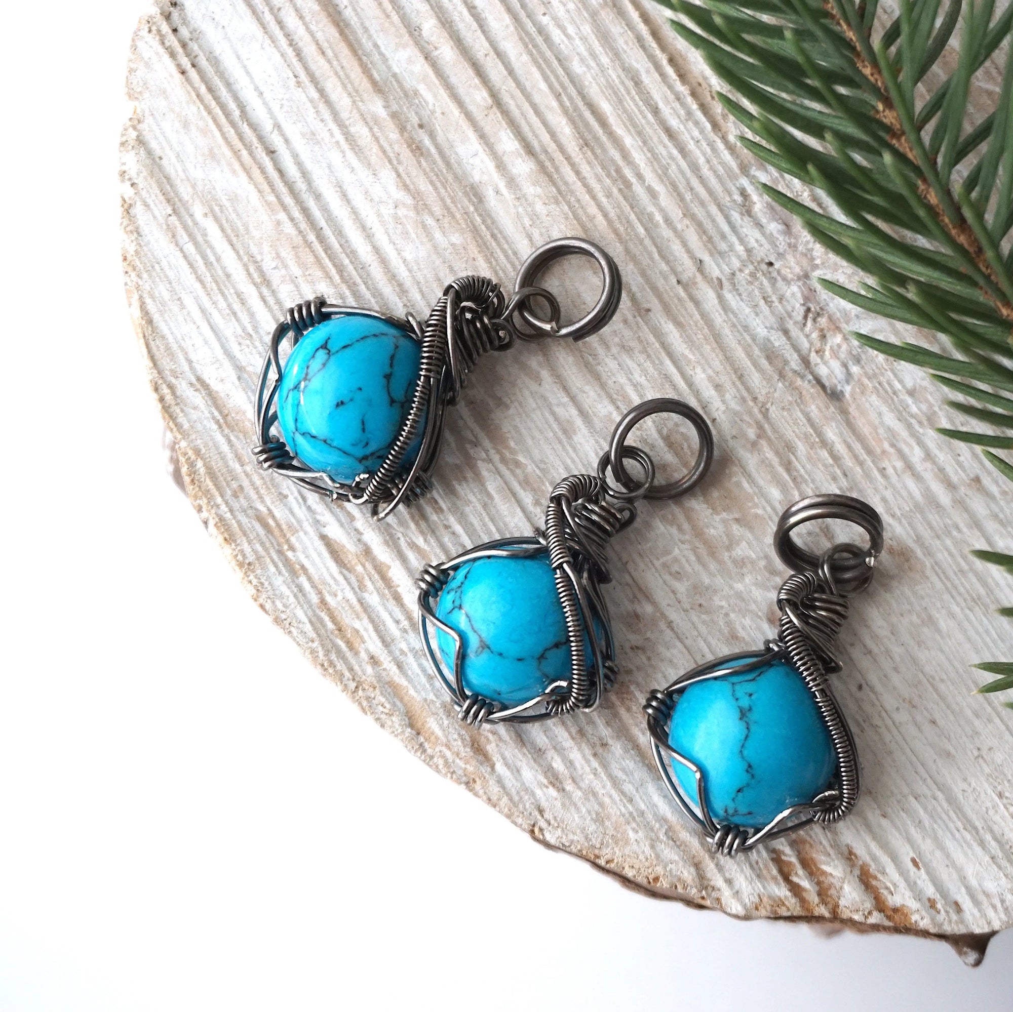 Natural turquoise pendants for men showing stone variations 10 carat sterling silver