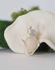 Back detail of silver wire wrapped opal and freshwater pearl pendant necklace, handcrafted gemstone jewelry