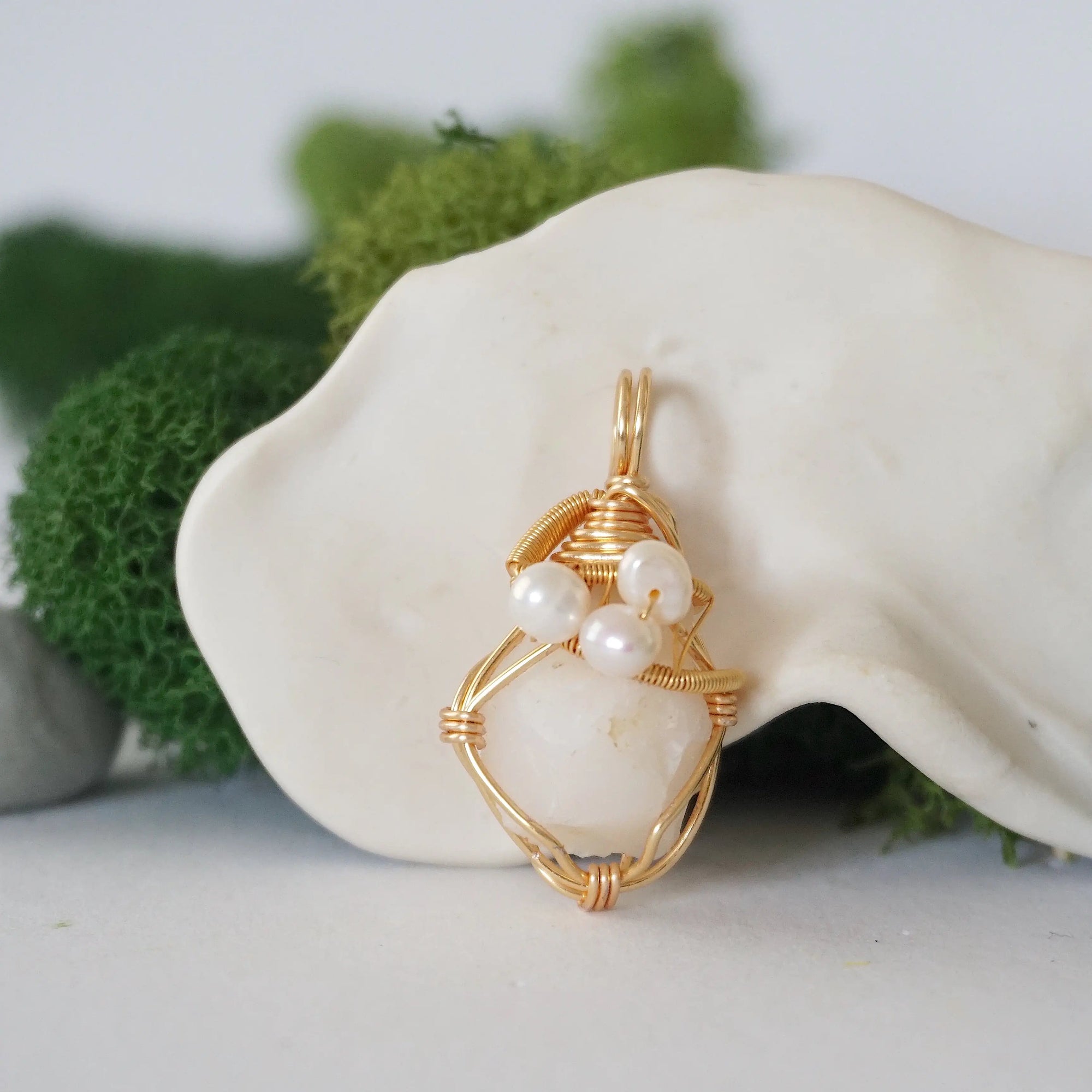 Detailed front angle of opal and freshwater pearl pendant, gold wire wrapped, handcrafted gemstone jewelry