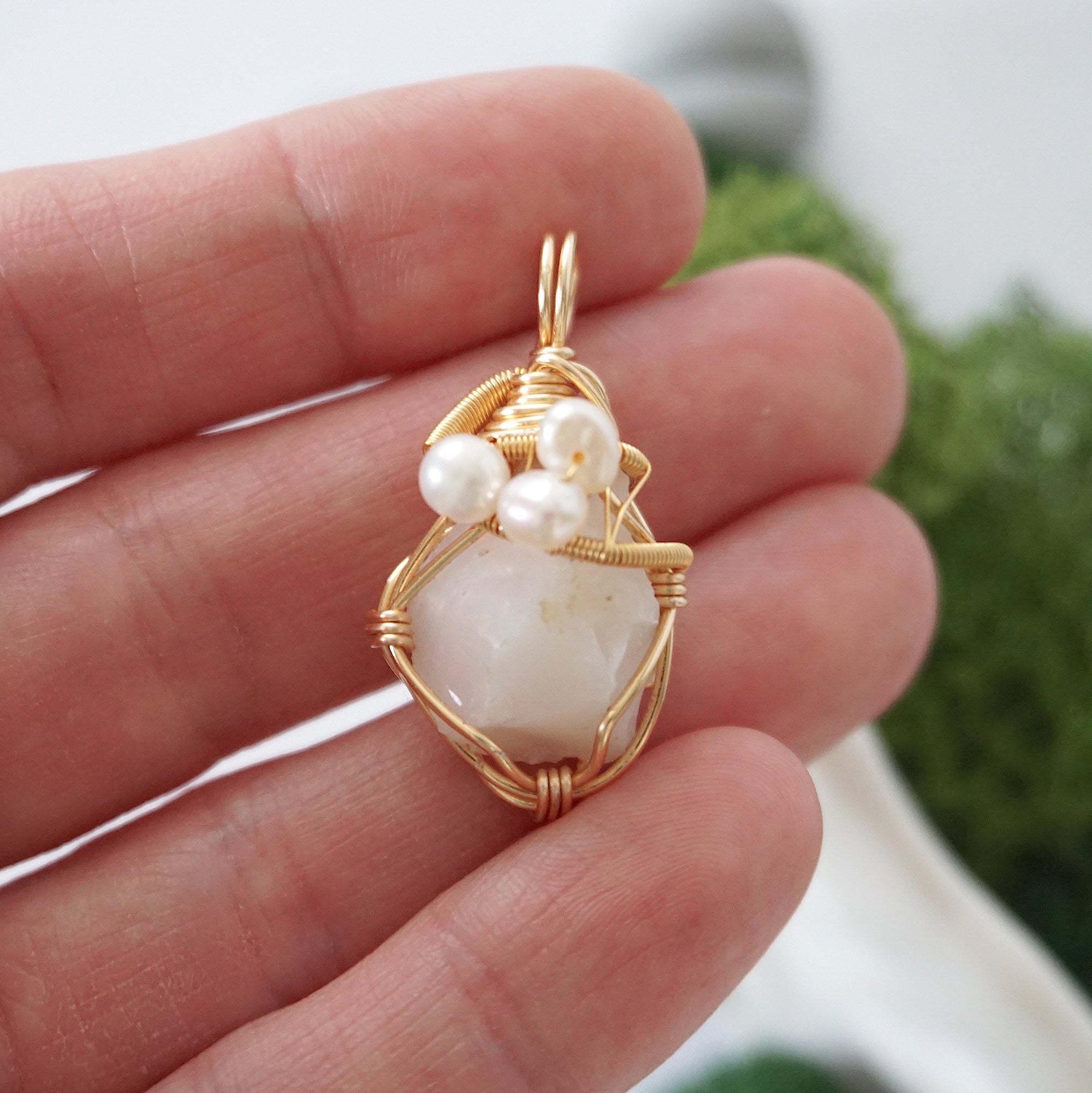 Opal and freshwater pearl necklace pendant in hand for size reference, artisan birthstone jewelry gift for her