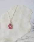 Back angle of natural pink ruby pendant in sterling silver prong setting — minimalist handmade crystal necklace, 925 sterling silver