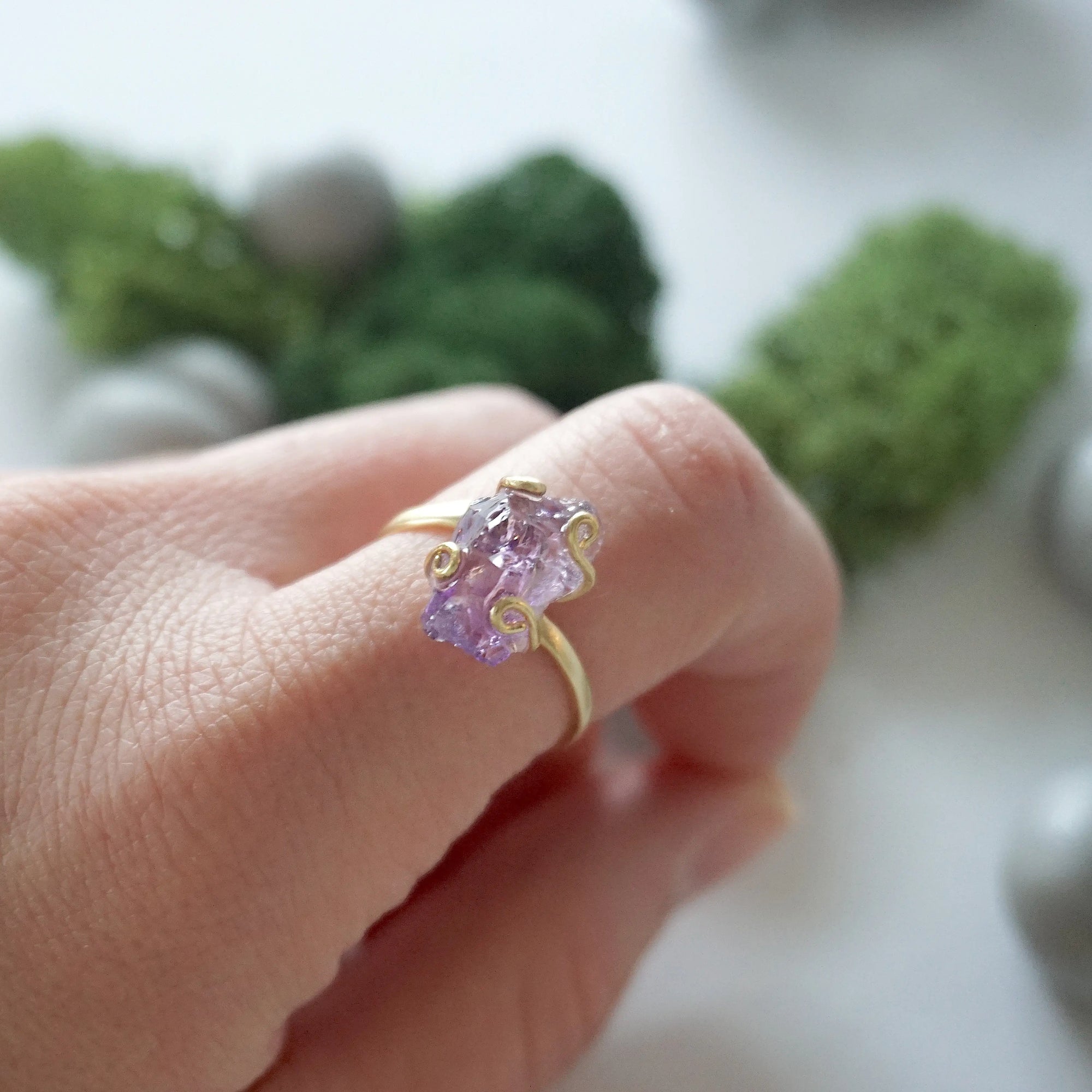 Raw amethyst ring for women in 14k gold vermeil claw setting, adjustable band on model hand
