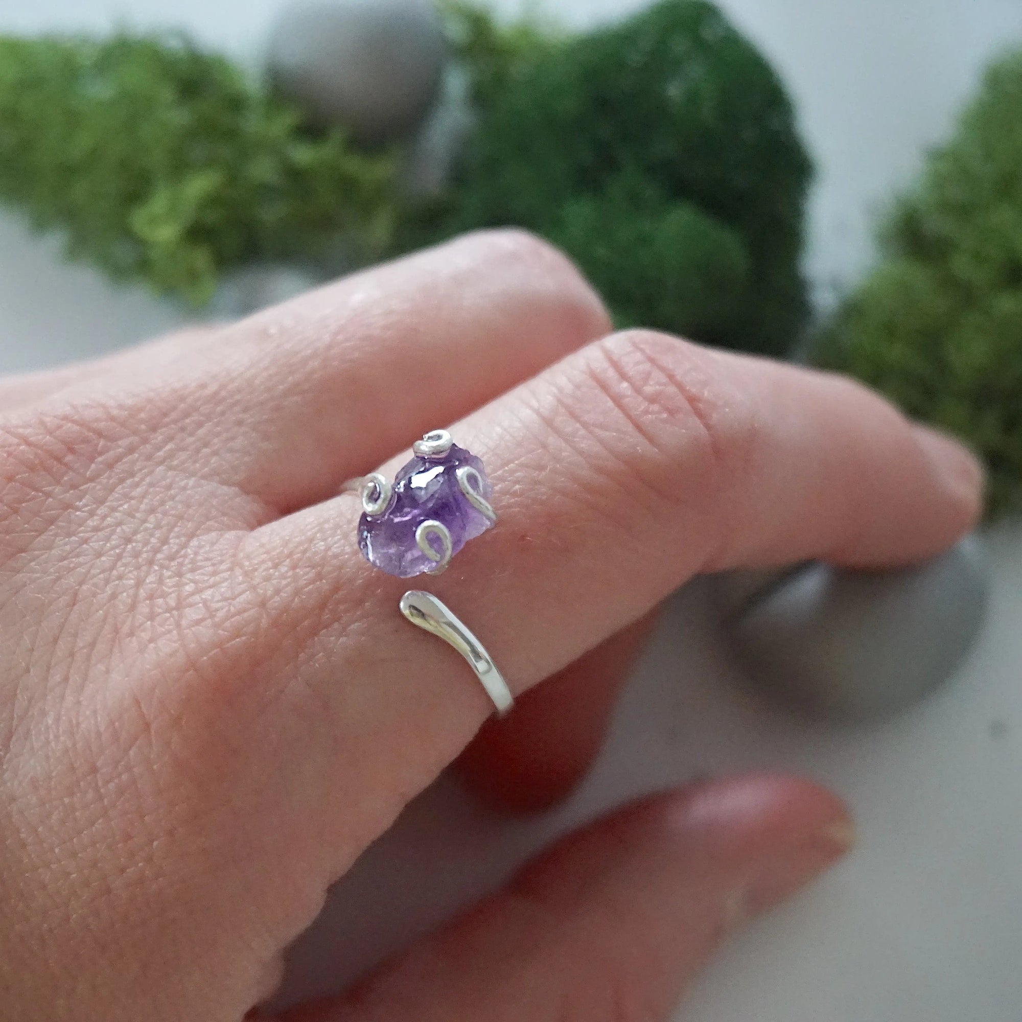 Adjustable raw amethyst ring in sterling silver, February birthstone crystal ring on model hand