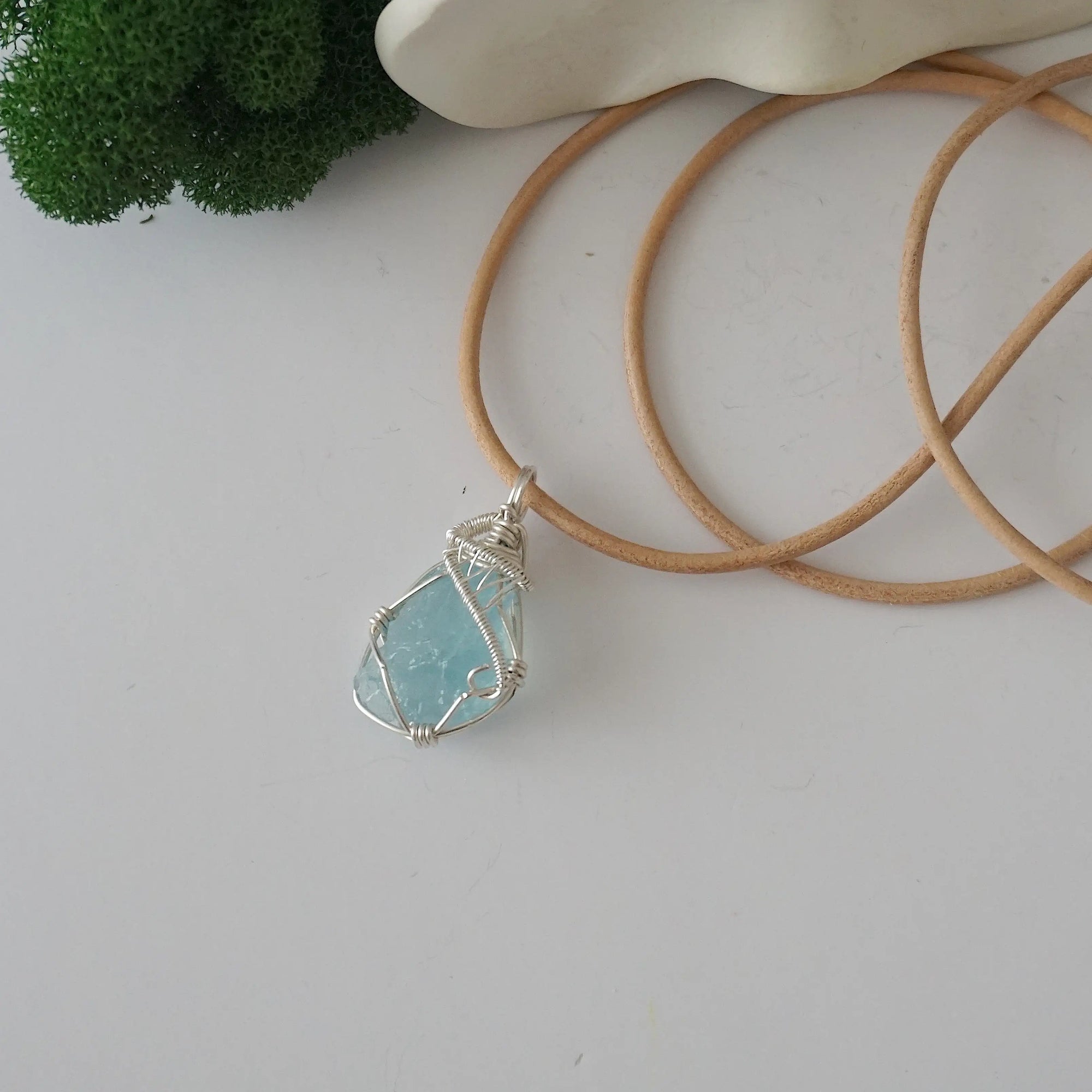 Raw aquamarine necklace for women — handmade 925 sterling silver wire wrapped pendant on genuine tan leather cord, March birthstone, by Designs by Nature Gems