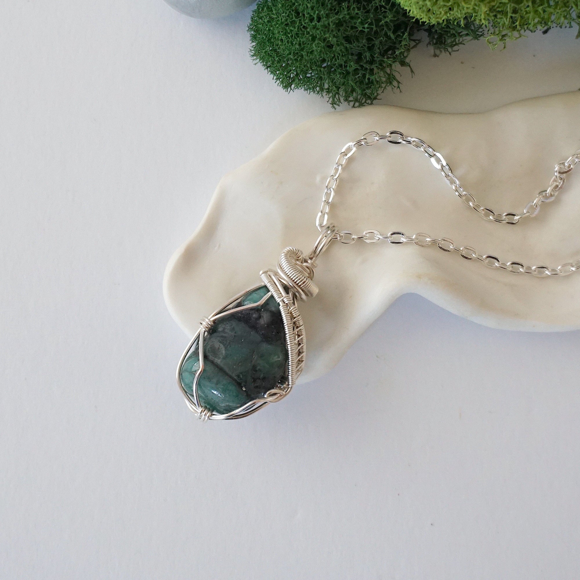 Raw emerald necklace in soft silver copper wire by Designs by Nature Gems, handcrafted May birthstone pendant for women.