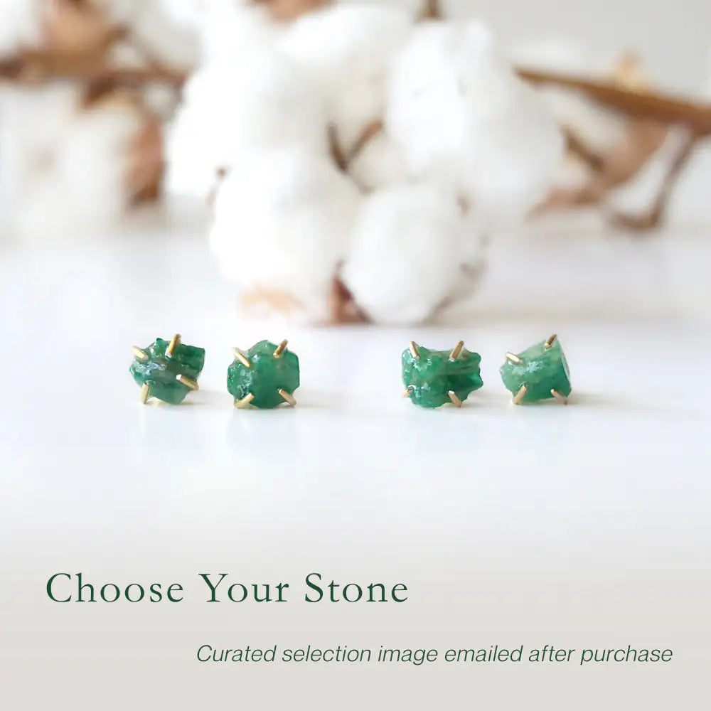 Two pairs of raw emerald stud earrings in 14k gold vermeil showing natural variation in emerald shape size and green colour