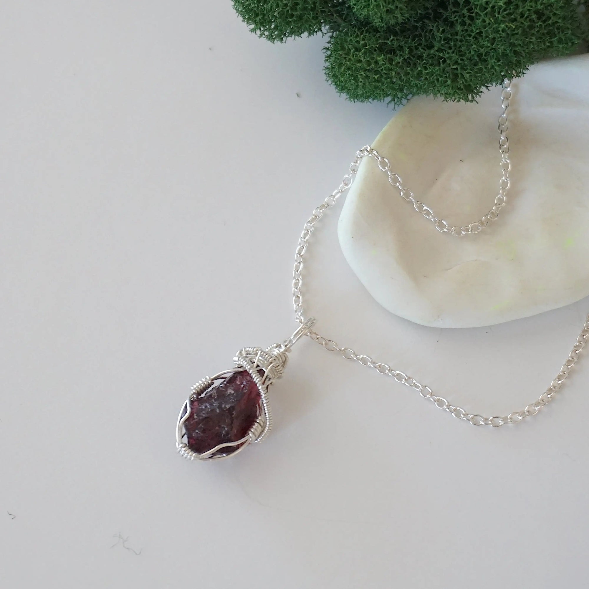 Raw garnet necklace with 925 sterling silver wire wrapped pendant on silver chain