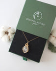 Raw Herkimer diamond necklace in 14k gold filled displayed in branded Designs by Nature Gems jewelry box. Artisan April birthstone gift for women.