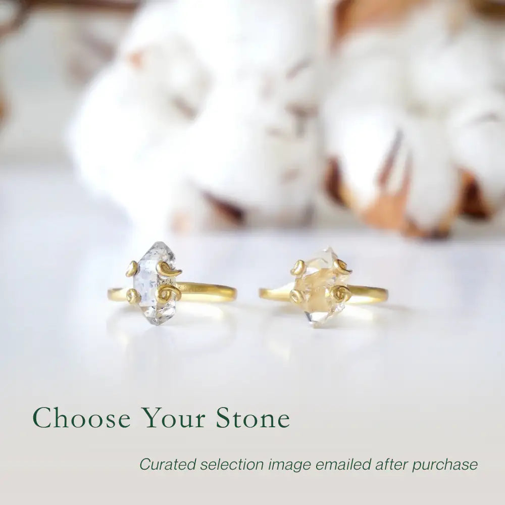 Two adjustable raw Herkimer diamond rings in 14k gold vermeil showing natural variation in stone size and shape.