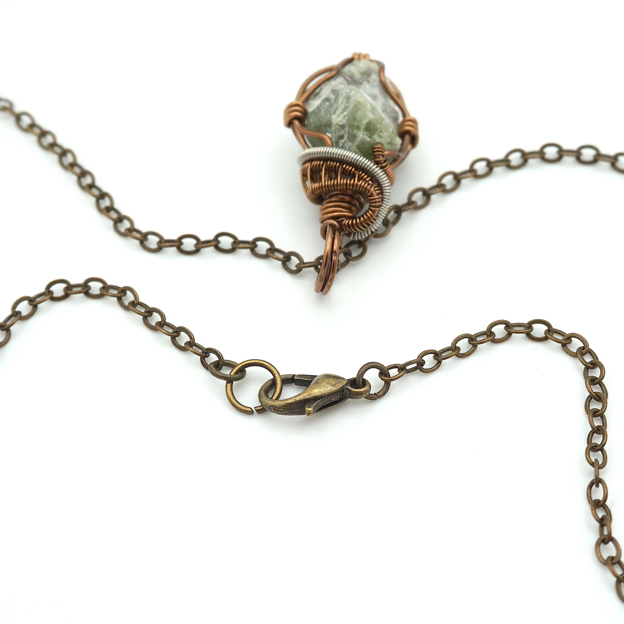 Antique bronze lobster clasp detail — raw peridot necklace for men, nickel-free handmade crystal jewelry by Designs by Nature Gems