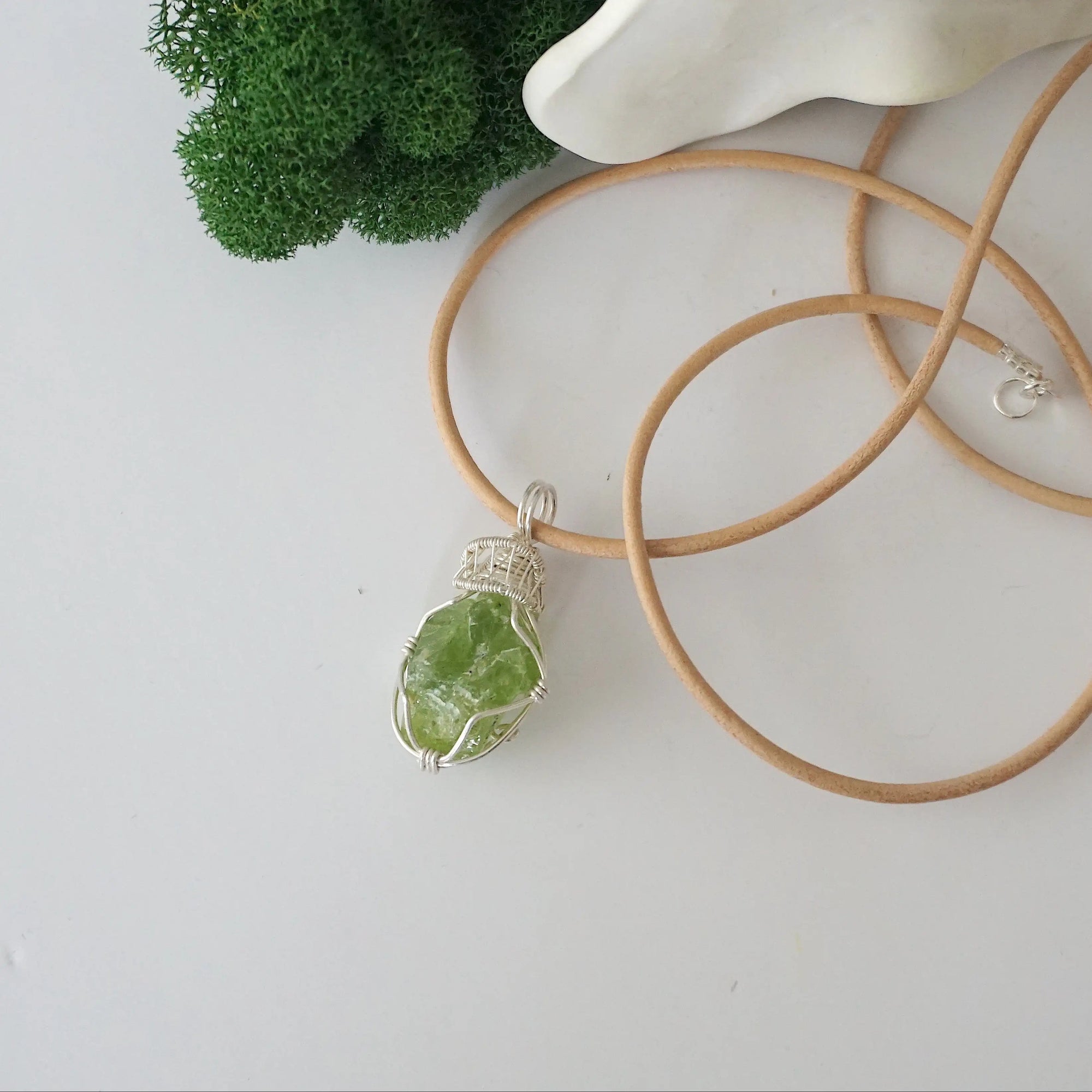 Raw peridot necklace for women — handmade 925 sterling silver wire wrapped pendant on genuine tan leather cord, August birthstone, by Designs by Nature Gems