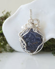 Back view of raw sapphire and freshwater pearl pendant showing the detail of 925 sterling silver wire-wrapping — one-of-a-kind handcrafted crystal jewelry
