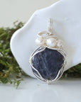 Front view of raw sapphire and freshwater pearl pendant in 925 sterling silver wire wrap — women's handcrafted crystal jewelry by Designs by Nature Gems