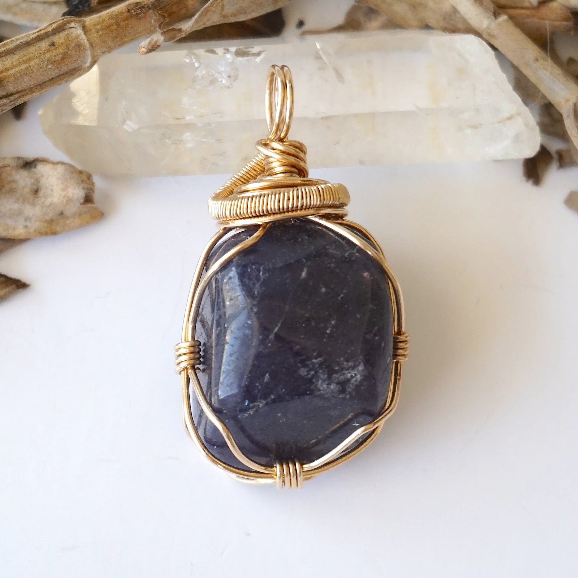 Front view of raw sapphire pendant in 14k gold-filled wire wrap — women's handcrafted crystal jewelry by Designs by Nature Gems