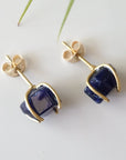 Back view of raw sapphire stud earrings showing the 14k gold vermeil posts and butterfly closures