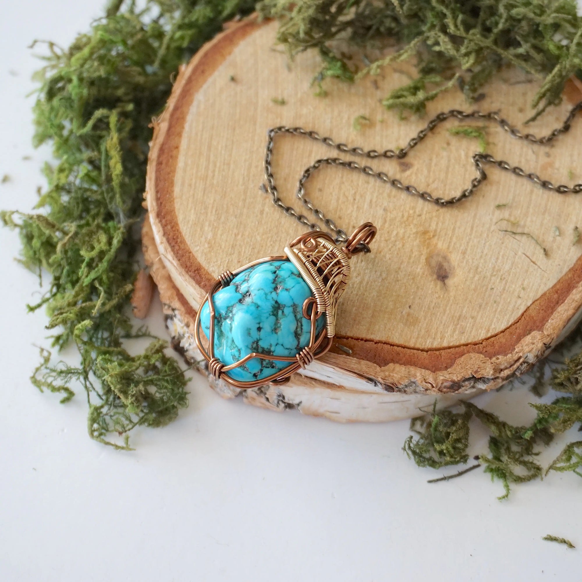 Raw turquoise necklace with bronze gold wire wrap on antique bronze chain