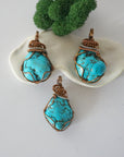 Three raw turquoise necklace variations showing natural stone differences, detailed handmade wire wrapped pendants