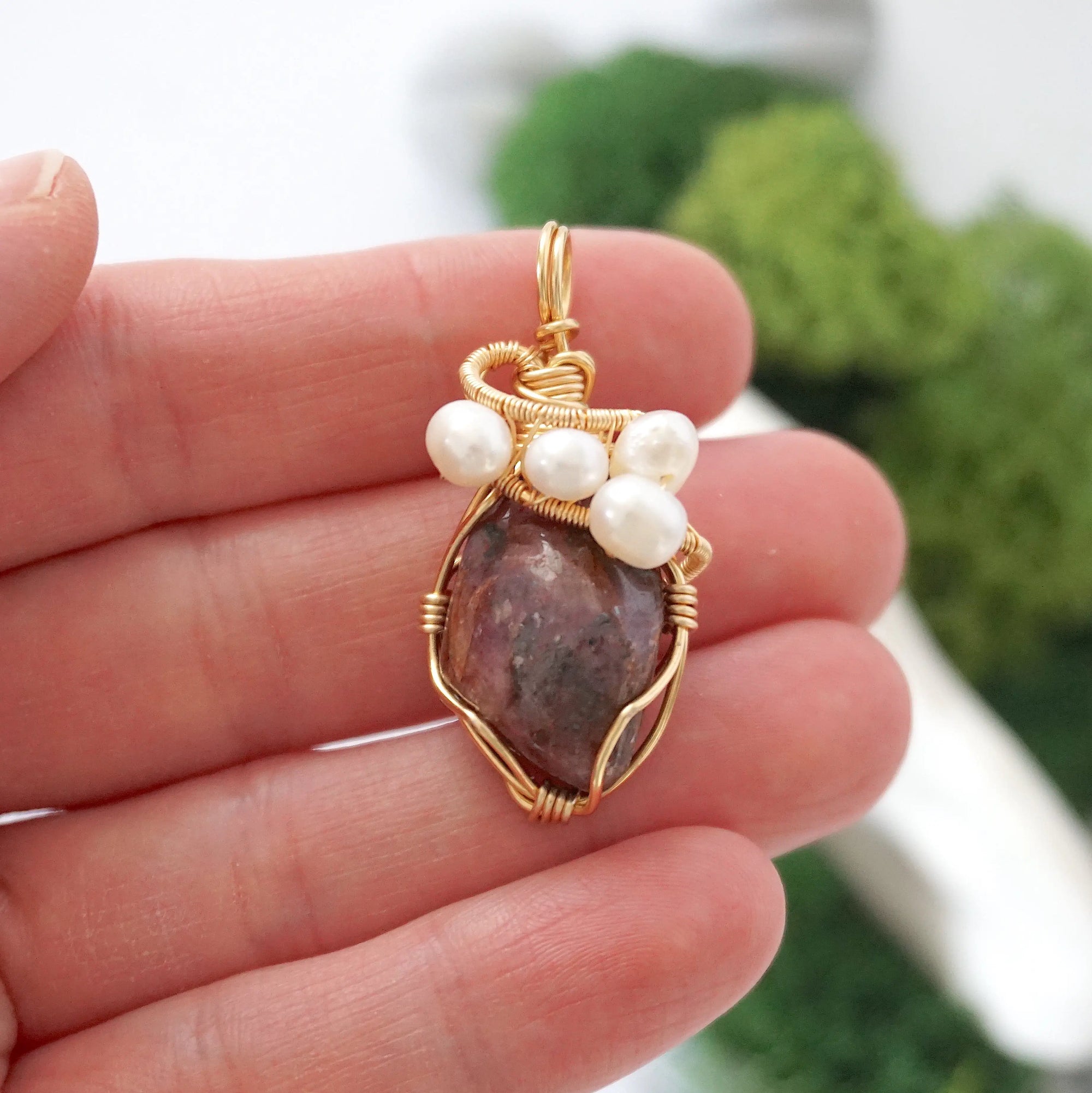 Ruby and freshwater pearl necklace pendant in hand for size reference, artisan birthstone jewelry gift for her