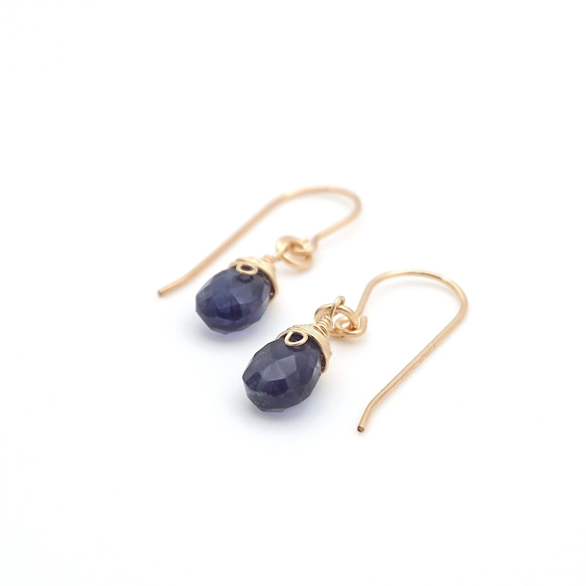Angled look at sapphire drop earrings, artisan wire wrapping in 14k gold filled, September birthstone