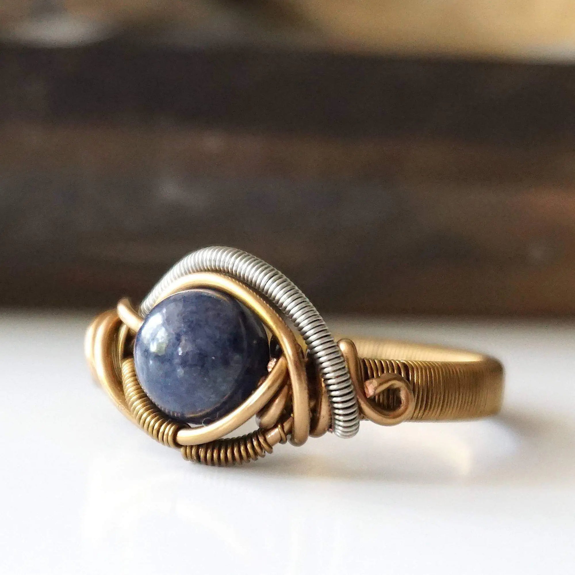 Natural sapphire ring with antique bronze and dark silver wire wrap — all-genders September birthstone jewelry by Designs by Nature Gems