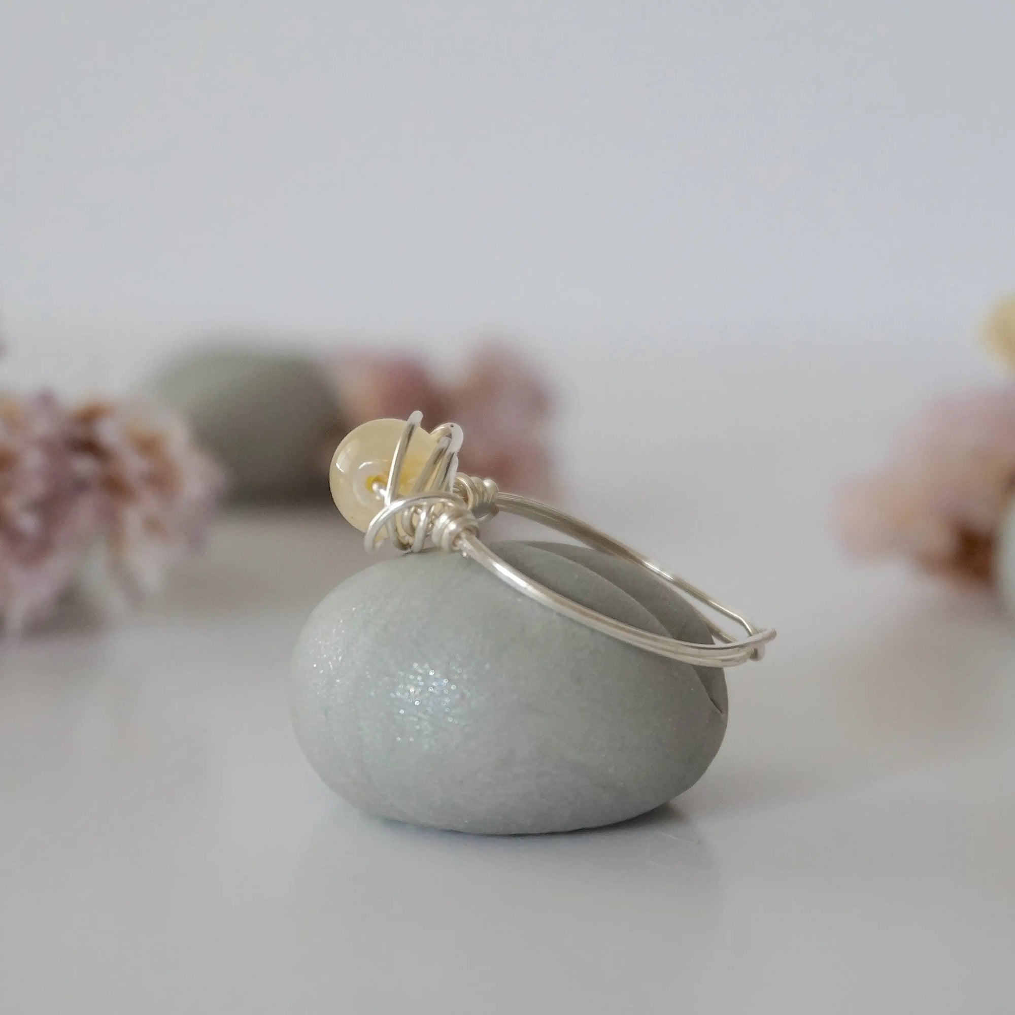 Side profile of raw silver citrine ring showing wire wrapping technique and crystal dimension - simple minimalist handmade crystal ring detail view