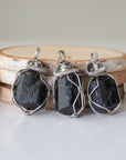 Three raw black tourmaline necklaces for men – shows natural variation in size, shape, and black color of tourmaline stones.