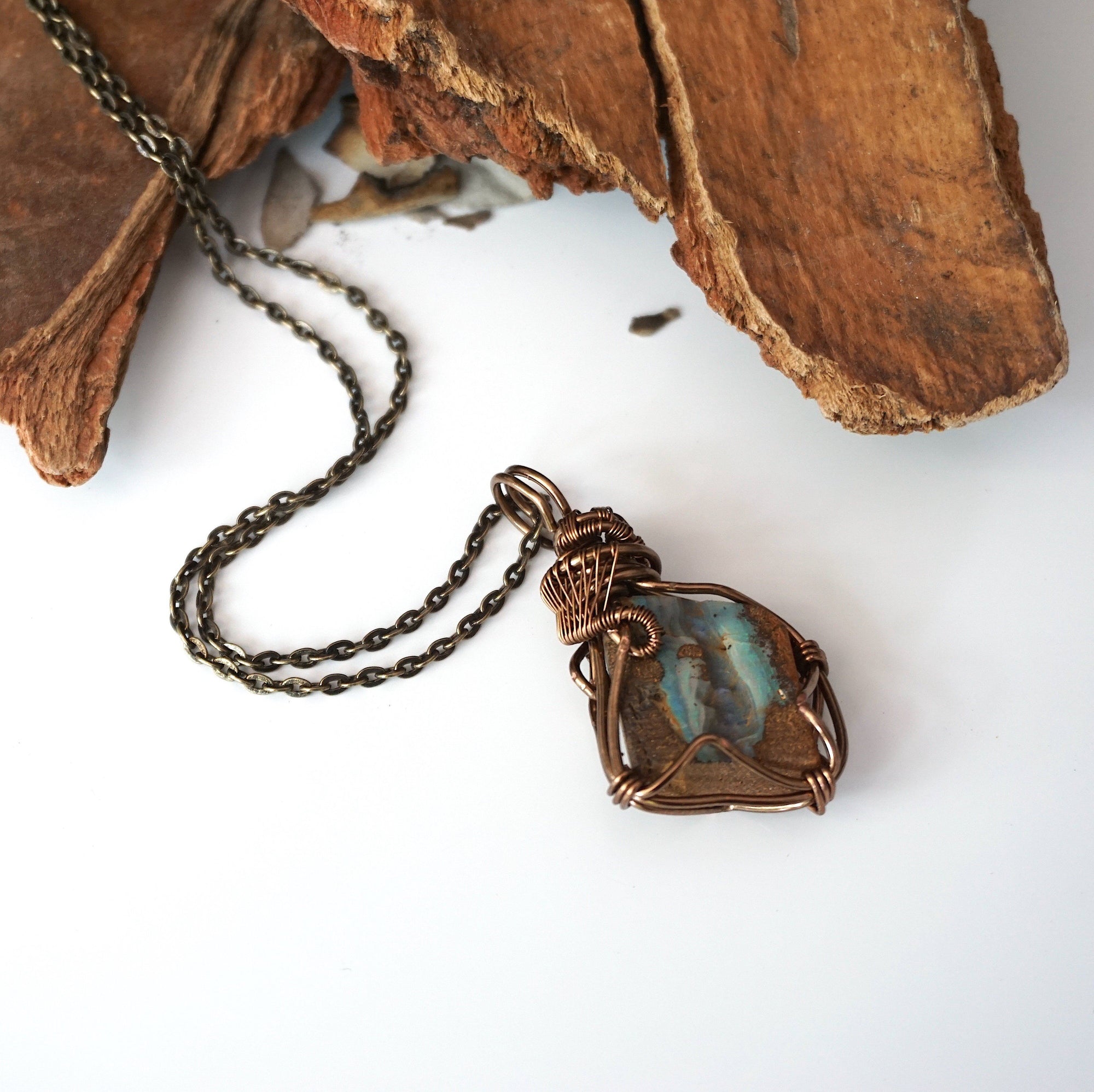 ustralian boulder opal pendant for men on antique bronze chain – handcrafted, artisan wire wrapped natural crystal.