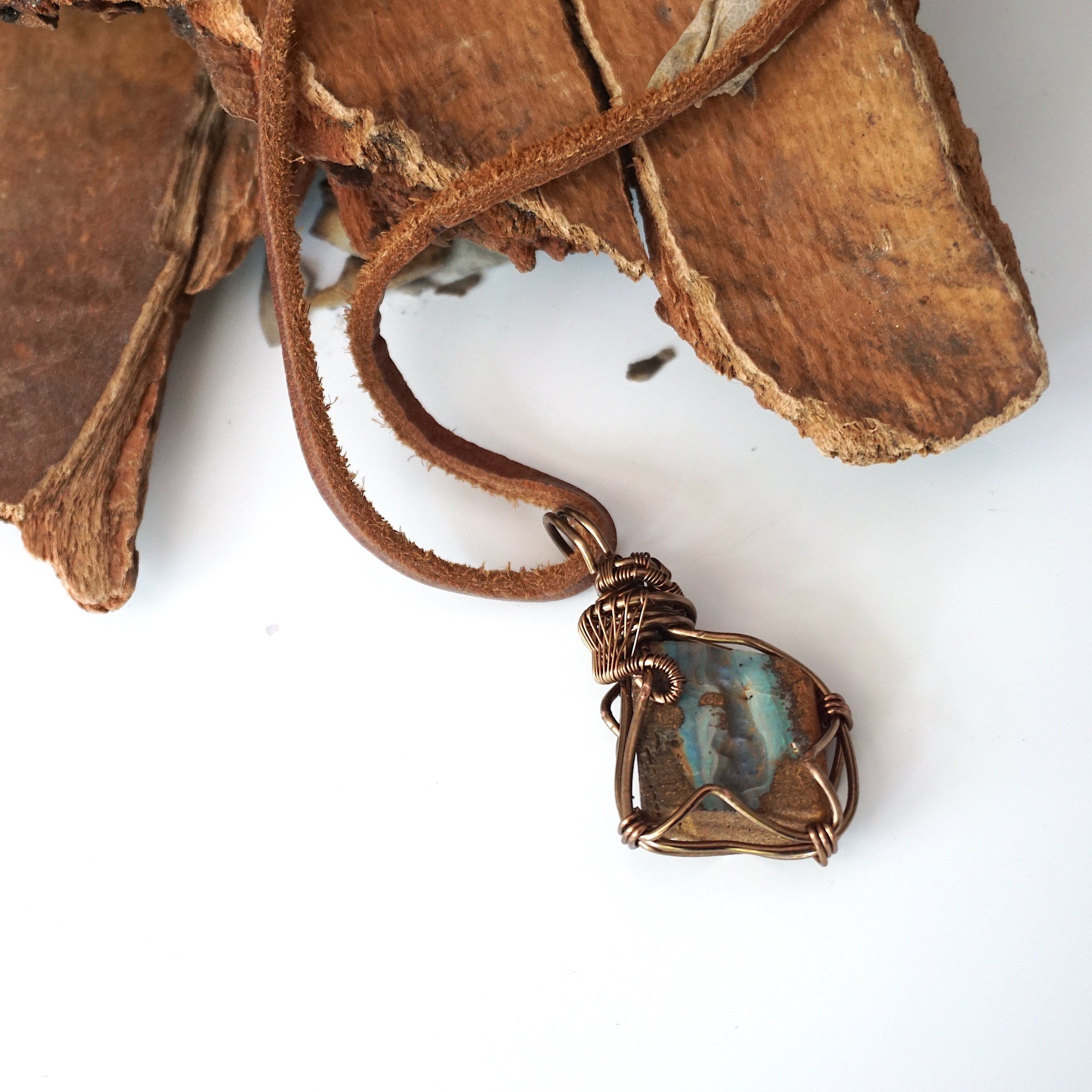 Australian boulder opal pendant for men on brown leather cord – artisan bronze copper wire wrapping, natural stone jewelry.